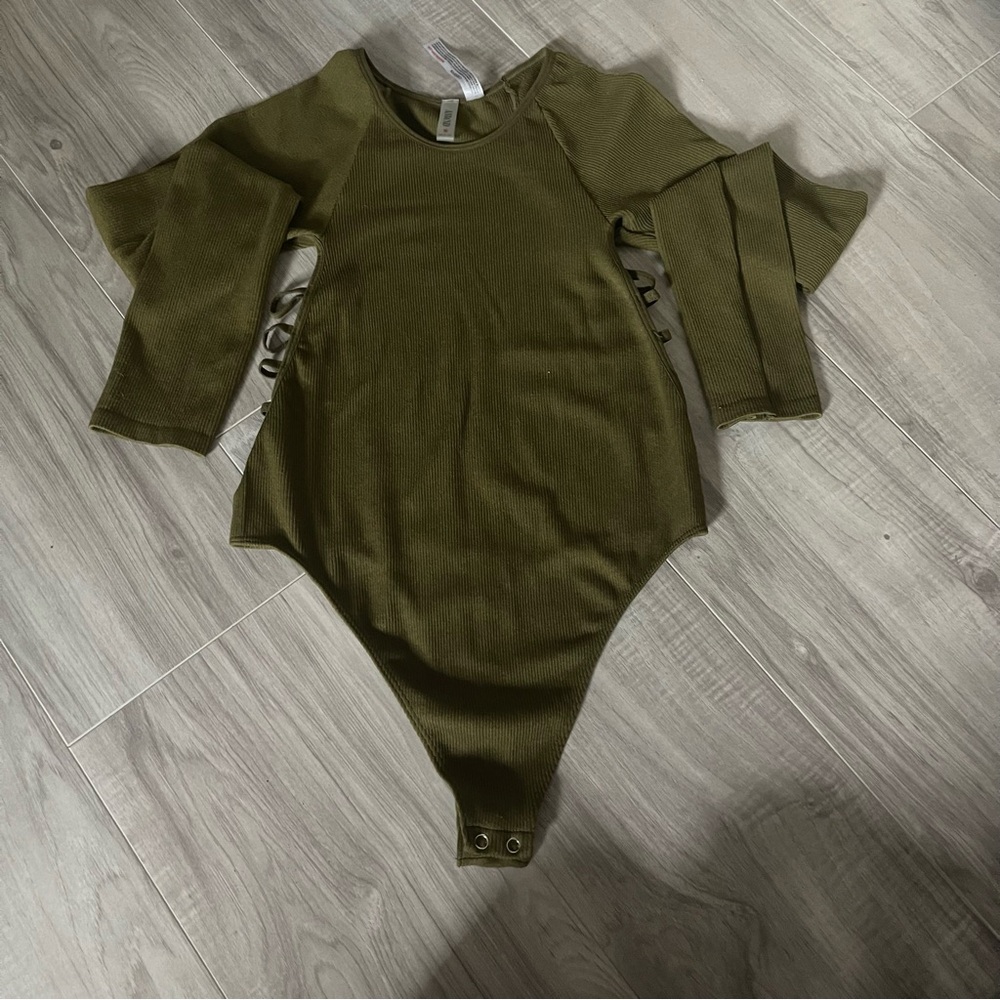 Green bodysuit with cutouts